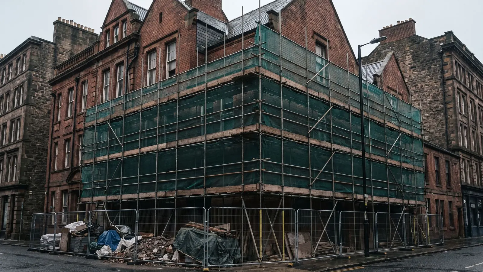 Scaffolding across the front of a Victorian commercial building mid-refurbishment